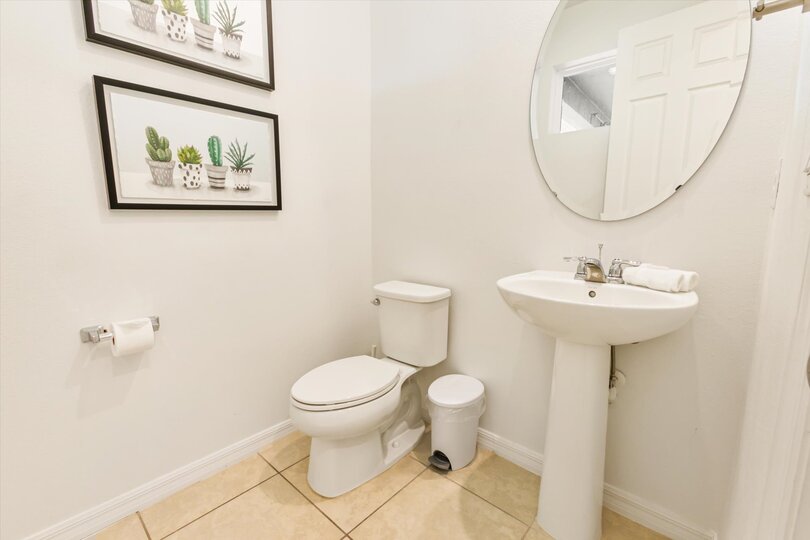 Half Bathroom 5, Downstairs
Off Kitchen by the Pool