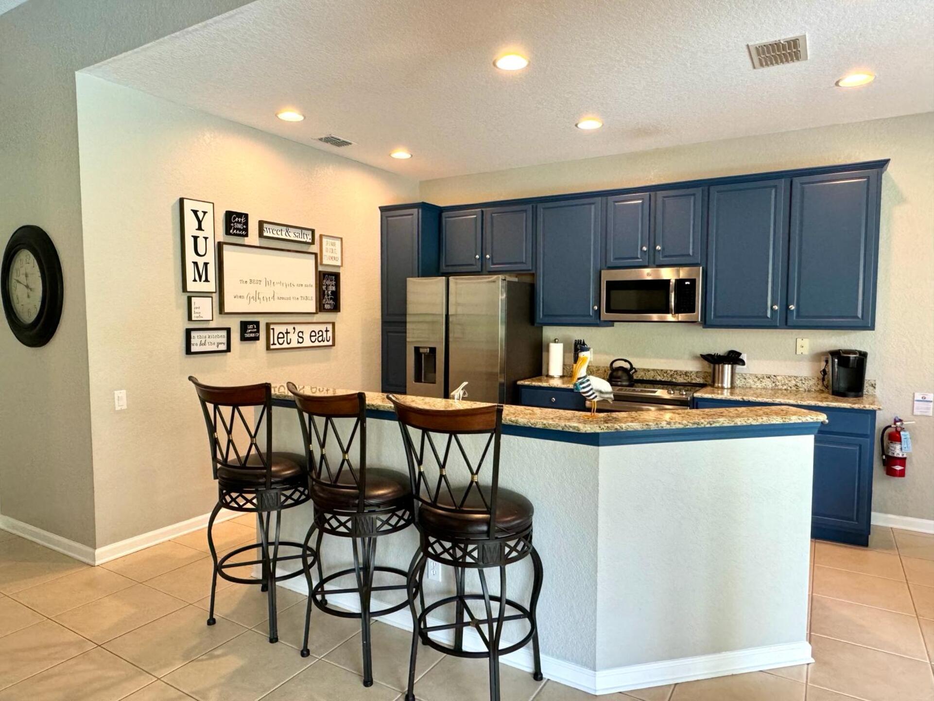 Enjoy a quick snack at the breakfast bar with seating for 3