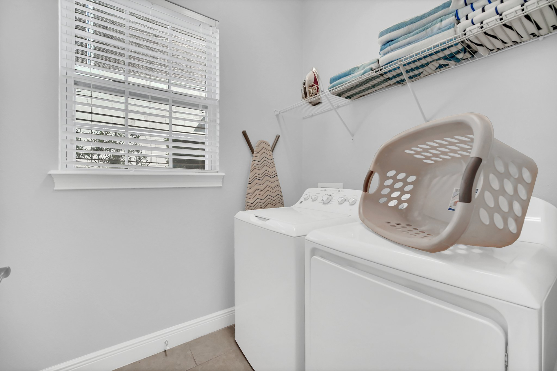 Downstairs laundry room for your convenience