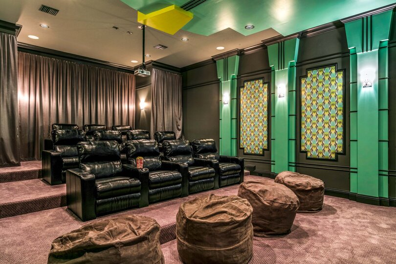 Watch your favorite movie in the Art Deco theater room located on the second floor