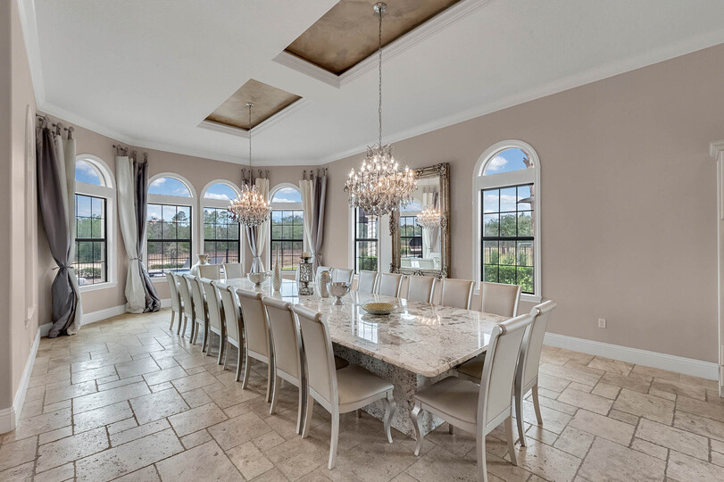 This luxurious formal dining table seats 20 guests to enjoy meals together