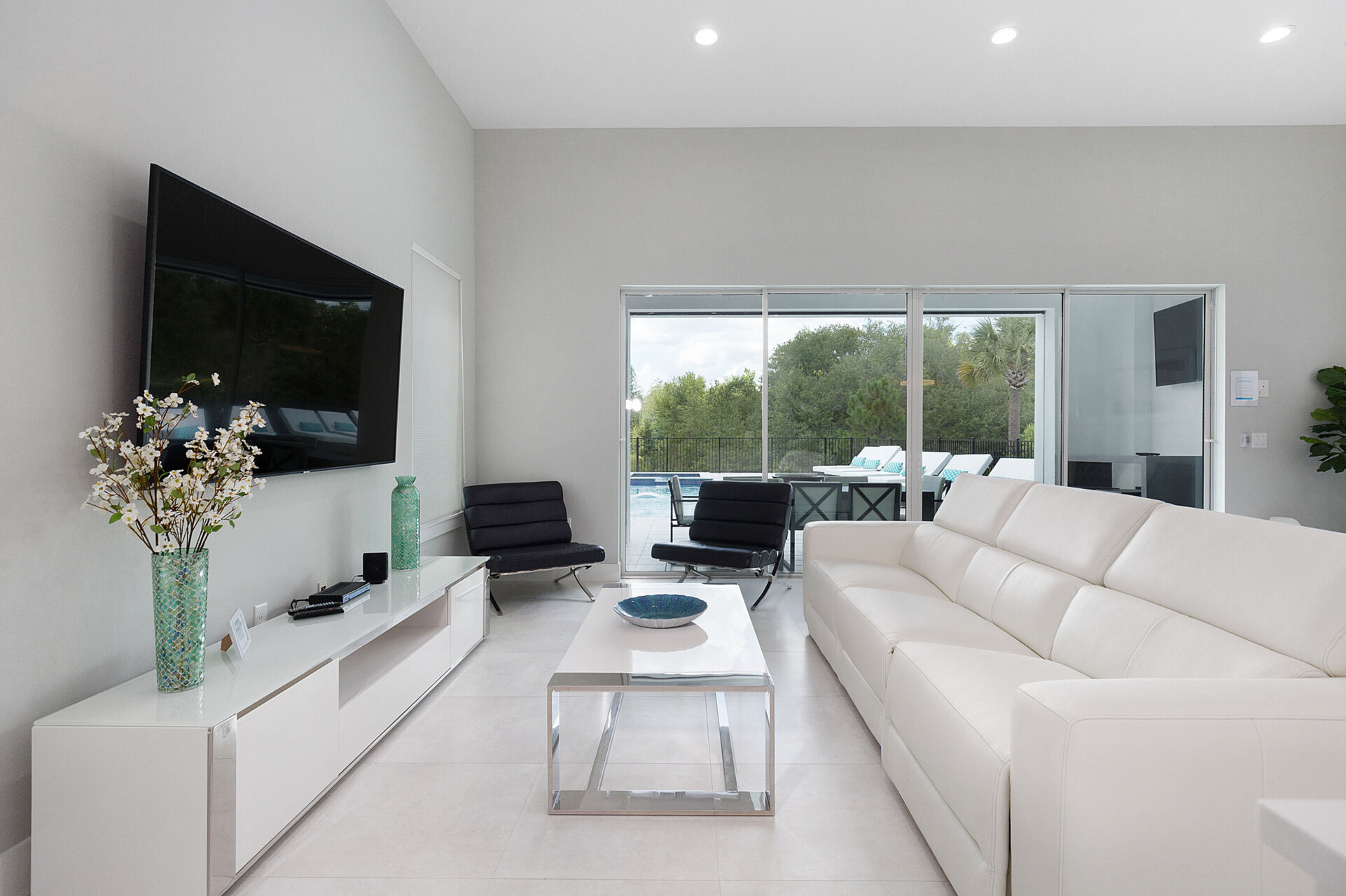 Cool off on the leather sofa seating in the living area