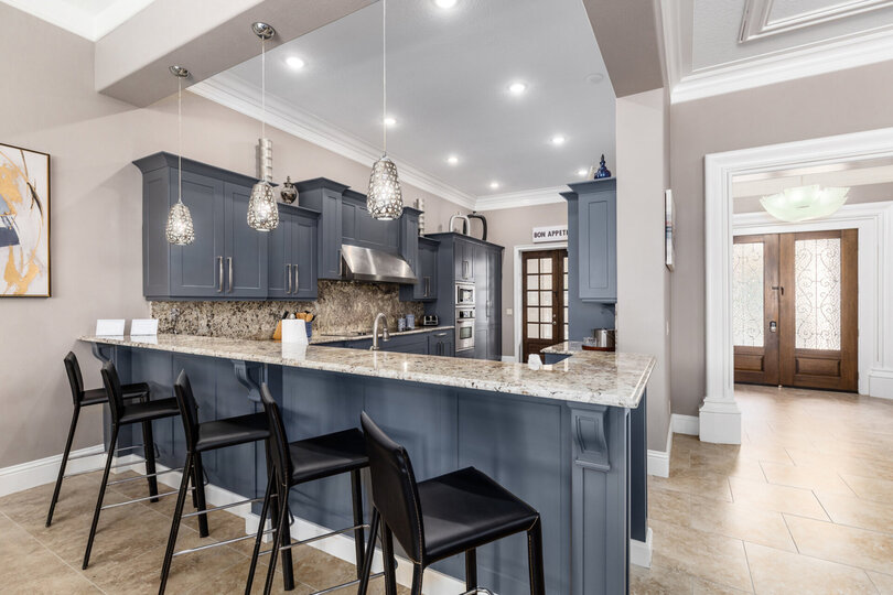 Plenty of comfortable seating and barstool seating for 5