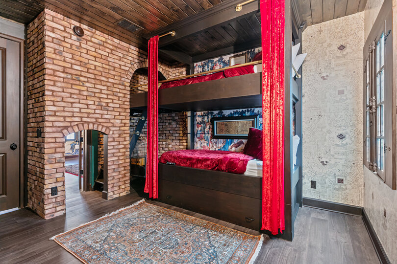 This room features a twin/twin custom bunk bed with en-suite.
