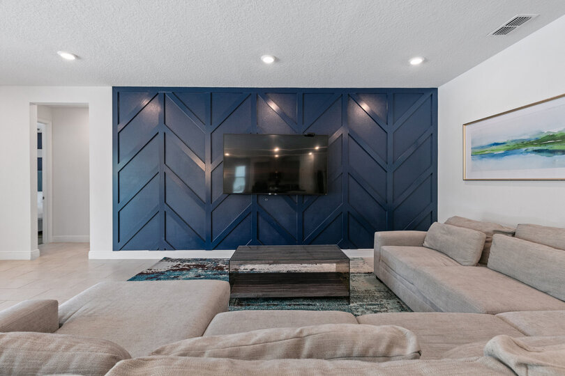 Get comfortable on the spacious sectional sofa and catch up on your favorite TV shows